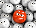 Angry emoticon face among others Royalty Free Stock Photo