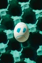 Angry face chicken white egg on a tray Royalty Free Stock Photo