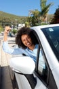 Angry female car driver showing her fist while driving Royalty Free Stock Photo