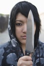 Angry Female Criminal Holding Knife Royalty Free Stock Photo