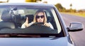 Angry female driver in auto Royalty Free Stock Photo