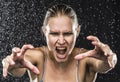 Angry Female Fighter Reaching Hands Towards Camera