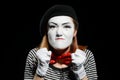 Angry female mime on black Royalty Free Stock Photo