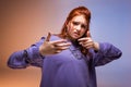 Female teenager gesturing in bad mood Royalty Free Stock Photo