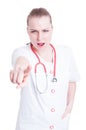 Angry frown doctor arguing and pointing finger to you