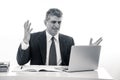 Angry and frustrated businessman with laptop shouting and worrying Royalty Free Stock Photo