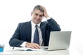 Angry and frustrated businessman with laptop shouting and worrying Royalty Free Stock Photo