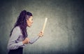 Angry woman with rolling pin screaming Royalty Free Stock Photo