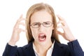 Angry and furious business woman with open mouth is screaming. Royalty Free Stock Photo