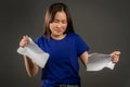 Angry furious female asian woman throwing crumpled paper, having nervous breakdown at work, stress management. Serious