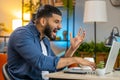 Angry furious Indian man freelancer using laptop working at home office nervous breakdown at work Royalty Free Stock Photo