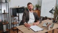 Angry furious man working at home office throwing crumpled paper, having nervous breakdown at work Royalty Free Stock Photo