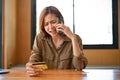 Angry and furious woman calling credit card call-centre service to complain the problems Royalty Free Stock Photo