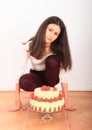 Angry girl with anniversary cake