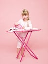 Angry girl ironing Royalty Free Stock Photo