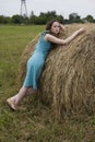 Angry girl standing near haystack Royalty Free Stock Photo