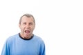 Angry grumpy middle aged man with open mouth screaming yelling isolated white background. Negative human emotion facial