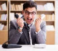 Angry helpdesk operator yelling in office Royalty Free Stock Photo