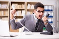 The angry helpdesk operator yelling in office Royalty Free Stock Photo