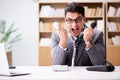 The angry helpdesk operator yelling in office Royalty Free Stock Photo