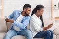 Angry Husband Catching Cheating Wife Texting On Cellphone With Another Man