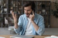 Angry irritated man talking on phone, arguing or complaining