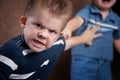 Angry little boy glaring and fighting Royalty Free Stock Photo