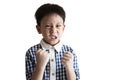 Angry little child clenched fist,show dissatisfied expression on face,feeling upset annoyed,bad behavior,Temperamental kid boy Royalty Free Stock Photo