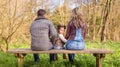 Angry little girl looking to the camera sitting on Royalty Free Stock Photo