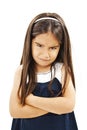 Angry little girl whit folded hand Royalty Free Stock Photo