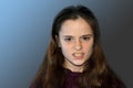 Angry looking teenage girl seeks revenge Royalty Free Stock Photo