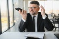 Angry mad frustrated businessman talking on phone complaining on bad service solving business corporate problem, annoyed Royalty Free Stock Photo