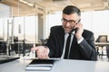 Angry mad frustrated businessman talking on phone complaining on bad service solving business corporate problem, annoyed Royalty Free Stock Photo