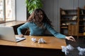 Stressed hysterical young woman throwing crumpled paper, having nervous breakdown at work Royalty Free Stock Photo