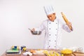 angry male chef holding bowl of dough and rolling pin Royalty Free Stock Photo