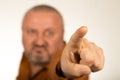 An angry man with beard pointing finger at you Royalty Free Stock Photo