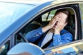 Angry man at car in traffic jam Royalty Free Stock Photo