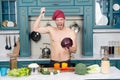 Angry man chef with torso stab knife at cabbage Royalty Free Stock Photo