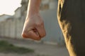 Angry man with clenched fist outdoors, closeup Royalty Free Stock Photo