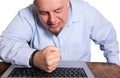 Angry man in front of computer Royalty Free Stock Photo