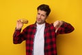 Angry Man Holding Burger Showing Thumbs Down Royalty Free Stock Photo