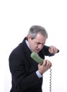 Angry man on the phone Royalty Free Stock Photo