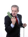 Angry man on the phone Royalty Free Stock Photo