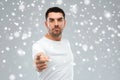 Angry man pointing finger to you over snow Royalty Free Stock Photo