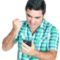 Angry man punching his mobile phone Royalty Free Stock Photo