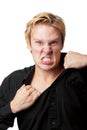 Angry Man Tearing His Shirt Royalty Free Stock Photo