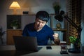 angry man working with laptop at night Royalty Free Stock Photo
