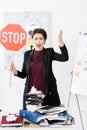 Angry manager holding stop sign and screaming Royalty Free Stock Photo