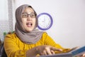 Angry muslim boss businesswoman screaming and pointing shows disappointed gesture