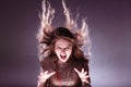 Angry mysterious woman girl with flying hair. Royalty Free Stock Photo